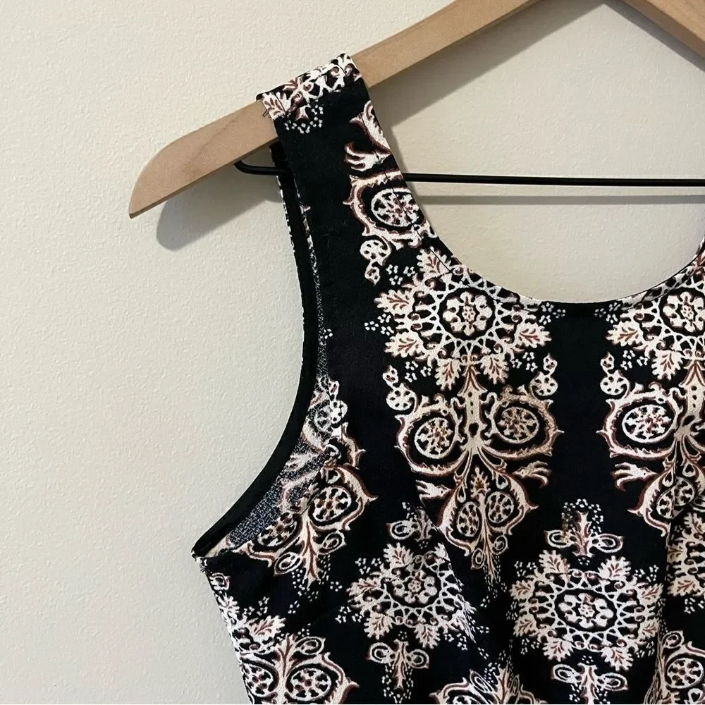 Lush  romper one piece Size small fun all over print sleeveless date